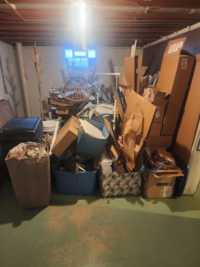 Roll-off dumpster container at job site for 6 Yard Dumpster Rental in Massena